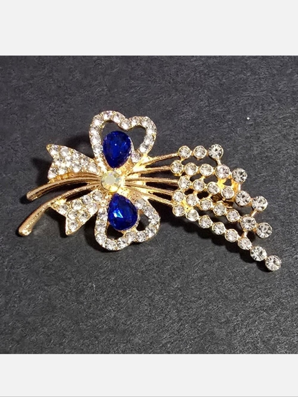 Fashion Jewelry Gold-tone Floral Brooch with Royal Blue Crystals